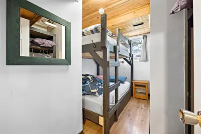 a room with two bunk beds in a tiny house at Margaritaville - Big Space with Lots of fun and Hot Tub 38R in Blue Mountains