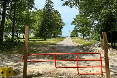 a gate on the side of a road at Wavy Daze Master in Wasaga Beach