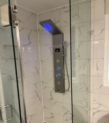 a shower with a control panel in a bathroom at Grandeur Homes in Whitby
