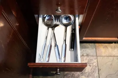 a wooden holder with three spoons in it at Chic 1BR Downtown Getaway w King Bed in Toronto
