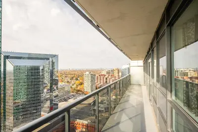 a balcony with a view of a city at Modern 2Bd 2Ba Skyscraper Free parking in Toronto