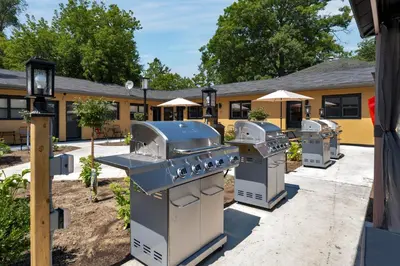 a group of appliances in front of a building at Adrian's Suites 2 Bedroom FamilySuite in Wasaga Beach