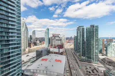 a view of a city with tall buildings at 1 Bedroom Condo Bremner Blvd Downtown Toronto in Toronto