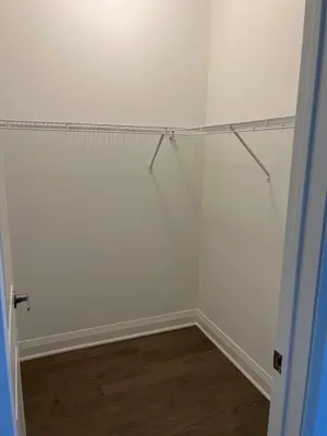 a room with white walls and a shower curtain at Bowmanville Room in Bowmanville
