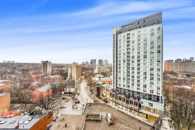 an aerial view of a city with a tall building at 251 Jarvis st -Steps to Eaton Centre - Monthly Stays Only in Toronto
