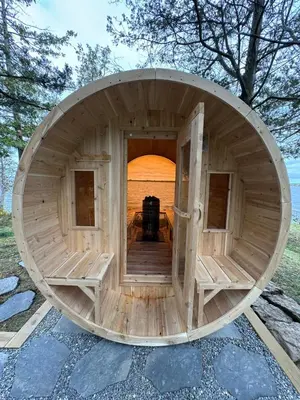 a large wooden sauna with a large window at Waterfront Casa in wine County with SAUNA and HOT TUB in Demorestville