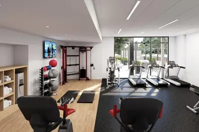 a gym with treadmills and cardio equipment in a room at Staybridge Suites Aurora East by IHG in Aurora