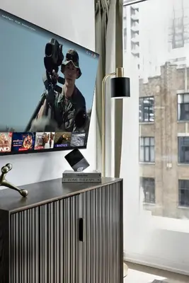 a flat screen tv sitting on top of a table at Trendy 1BR in TO Steps to Entertainment & Dining in Toronto