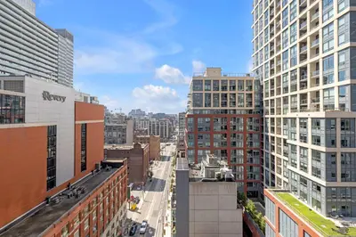 an aerial view of a city with tall buildings at Prime 2BR Condo with Massive Patio & Parking in Toronto