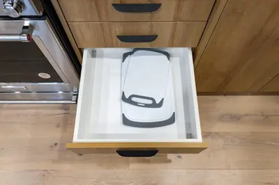 a computer mouse in a box on the floor at Modern Parkdale Getaway 1-Bedroom Parking in Toronto