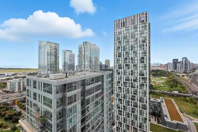 an aerial view of a city with tall buildings at Family-Friendly Sleep 8 Steps to all Attractions in Toronto