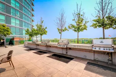 a row of sinks on top of a building at Lakeview 1-Bedroom Condo-Downtown Toronto-Free Parking in Toronto