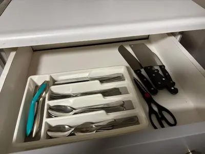 a drawer filled with utensils in a refrigerator at Spacious 2-BR Basement Suite Near Lake Simcoe & Beach Park in Innisfil