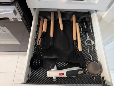 a drawer filled with cooking utensils in a kitchen at Modern 3BR Home Near Niagara Falls & Welland Canal in Welland