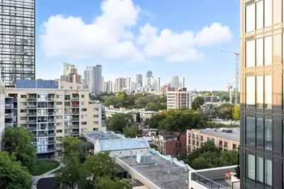 a view of a city with tall buildings at Modern Studio-Style Condo in Downtown Toronto in Toronto