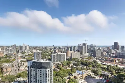 an aerial view of a city with buildings at Bright 2BR Downtown Toronto Condo in Toronto