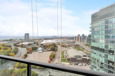 a view of a city from a high rise building at Stunning 1BD Lakeview Condo near BMO Free Parking in Toronto