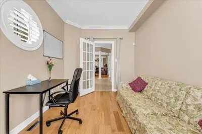 a living room with a couch and a table at Luxury Mansion by Toronto and YYZ with Large Backyard Weddings in Brampton