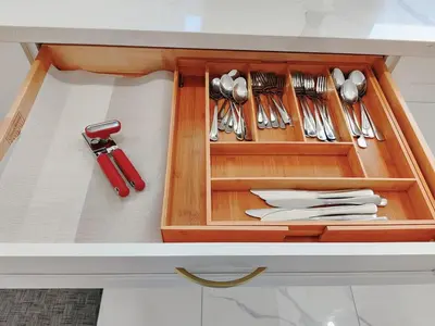 a wooden drawer with utensils in a kitchen at 5 Bed 4Bath 9 Parking Lakeside Retreat in Ajax