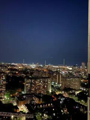 a view of a city at night with lights at Luxury All-Inclusive One-Bedroom Condo in Downtown in Toronto