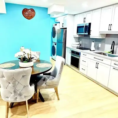 Modern 2BR suite Kitchen Workspace Laundry