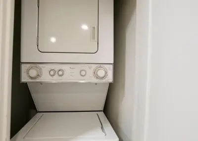 a white washer and dryer in a small kitchen at The Ember Suite in Peterborough