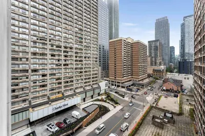 an aerial view of a city with tall buildings at Luxury 1-Bedroom Condo in Yorkville, Downtown Toronto in Toronto