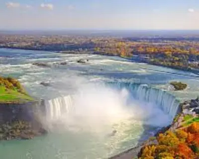 an aerial view of a waterfall in a river at RIVERSIDE STAY in Niagara Falls