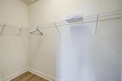 a bathroom with white walls and a shower curtain at Modern Spacious Luxury detached-House new in RH in Richmond Hill