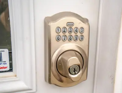 a door knob on a door with a window at Vineyard 2 Bed Farm Home | Mins to Town & Wineries in Niagara on the Lake