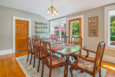 a dining room with a table and chairs at Hot Tub | Heart of Old Town NOTL | 2 Guests in Niagara on the Lake