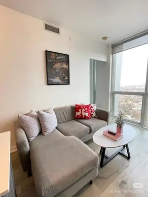 a living room with a couch and a table at xto in Markham