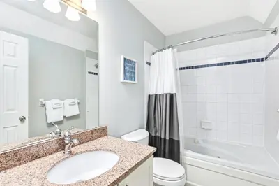 a bathroom with a sink and a toilet at 109 North Creek in Blue Mountains