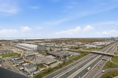 an aerial view of a city with a highway at Skyline Studio with Stunning City Views & Parking in Toronto