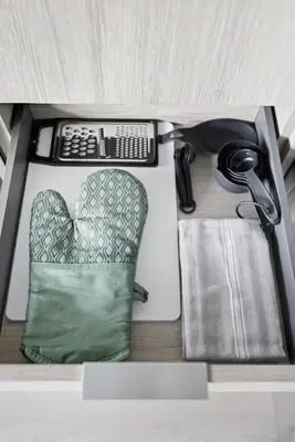 a gun and a pillow in a drawer at Skyline Studio with Stunning City Views & Parking in Toronto