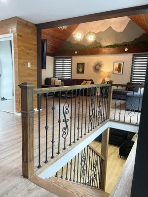 a staircase in a house with a living room at Cottage getaway in the city, for intimate family gathering in Ajax