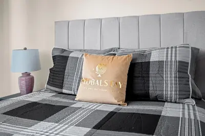 a bed with a pillow on top of it at High Floor 1 Bedroom Condo City View Downtown Toronto in Toronto