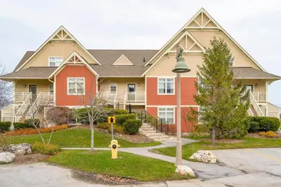a house with a street light in front of it at Bears Den - Hot Tub - Ski Views - Walk to Village in Blue Mountains