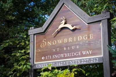 a sign for the snow bridge at blue snow bridge at Hidden Haven - Shuttle to Blue - Private Patio in Blue Mountains