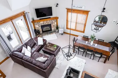 an overhead view of a living room with a couch and a table at Snowy Mountain Summit & Sol - Shuttle - Patio in Blue Mountains