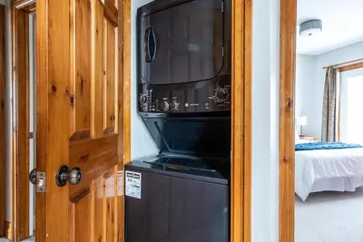 a microwave sitting on top of a refrigerator at Snowy Mountain Summit & Sol - Shuttle - Patio in Blue Mountains