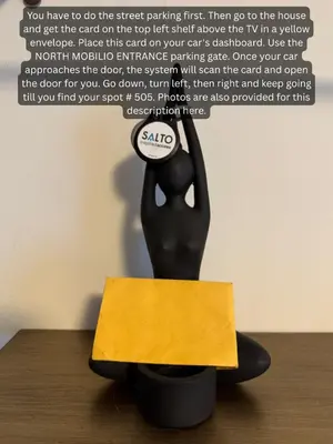 a black statue sitting on top of a table with a sign at Centrally Located 3-Bedroom Townhouse in Vaughan in Vaughan