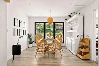 a dining room with a table and chairs at The County Haus - Indoor Pool & Finnish Sauna in West Lake