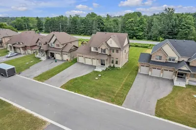 an aerial view of a residential neighborhood with houses at Spacious & New Prince Edward County Villa in Carrying Place