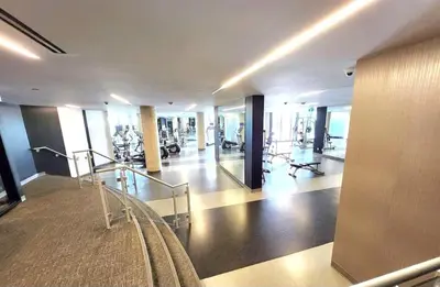 a gym with treadmills and machines in a building at Amazing one bedroom suite with panoramic downtown views in Toronto