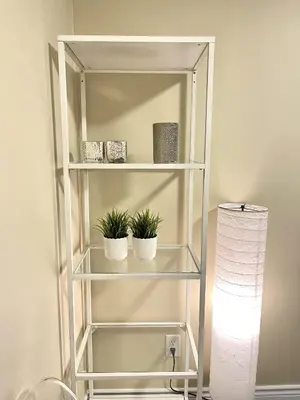 a white book shelf with three plants in it at Maison Laurier, Modern 5B4B Home Inc BSMT Free parking, Close to trails in Richmond Hill