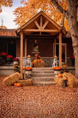 a house with a porch with pumpkins on it at Peaceful Forest Retreat with Fire Pit and BBQ near Mansfield Ski Club in Mulmur