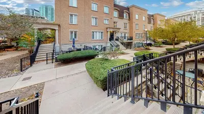 a building with a staircase in front of a building at Liberty Village-BMO Field-Roof Patio-Parking in Toronto