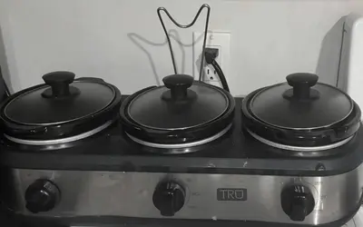 two pots sitting on top of a stove at A very peaceful home in Oshawa