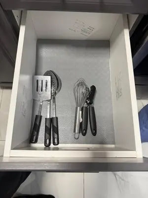 a kitchen utensils are arranged in a box at Modern Luxury Private Suite with Parking - Mississauga in Mississauga